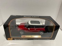 1:18 MAISTO MINI COOPER RED/WHITE ON BLACK image
