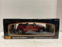 1:18 MAISTO MINI COOPER RED/WHITE ON BLACK image