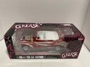 1:18 AUTO WORLD GREASED LIGHTNING RED ON WHITE image