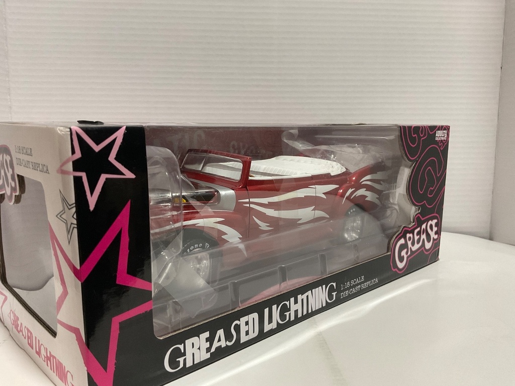 1:18 AUTO WORLD GREASED LIGHTNING RED ON WHITE image