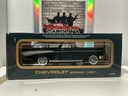 1:18 ROAD TOUGH 1957 CHEVROLET NOMAD BLACK ON RED image