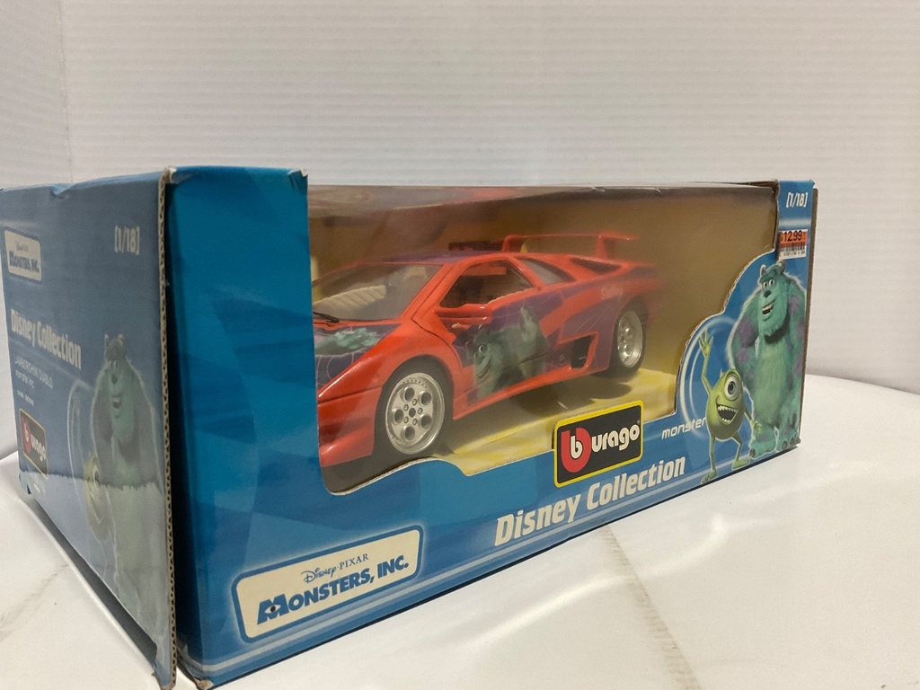 1:18 BURAGO DISNEY COLLECTION MONSTERS INC SULLEY ORANGE/PURPLE image