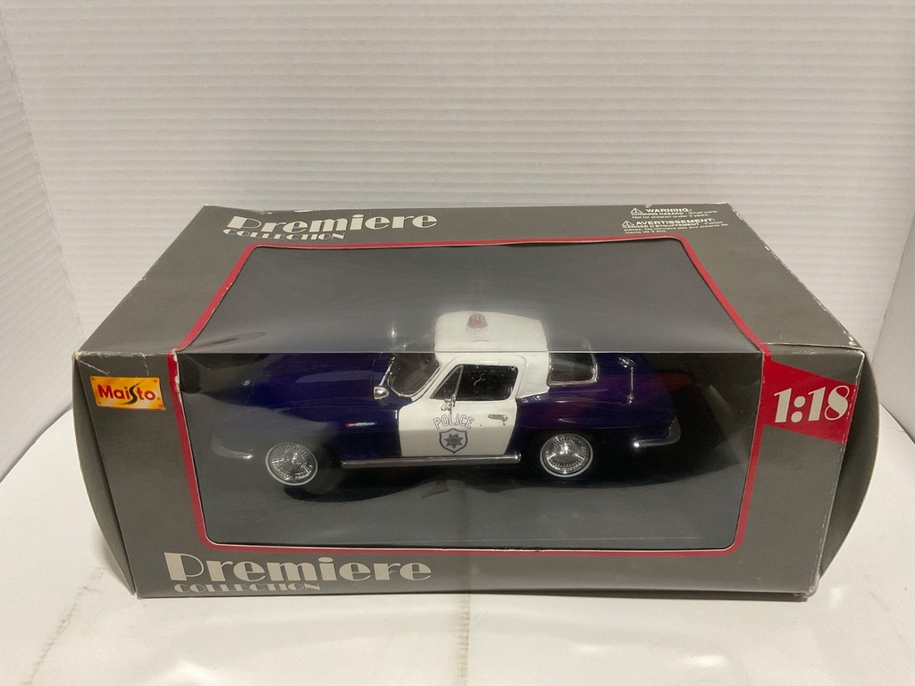 1:18 MAISTO PREMIERE COLLECTION POLICE BLUE/WHITE ON BLACK image