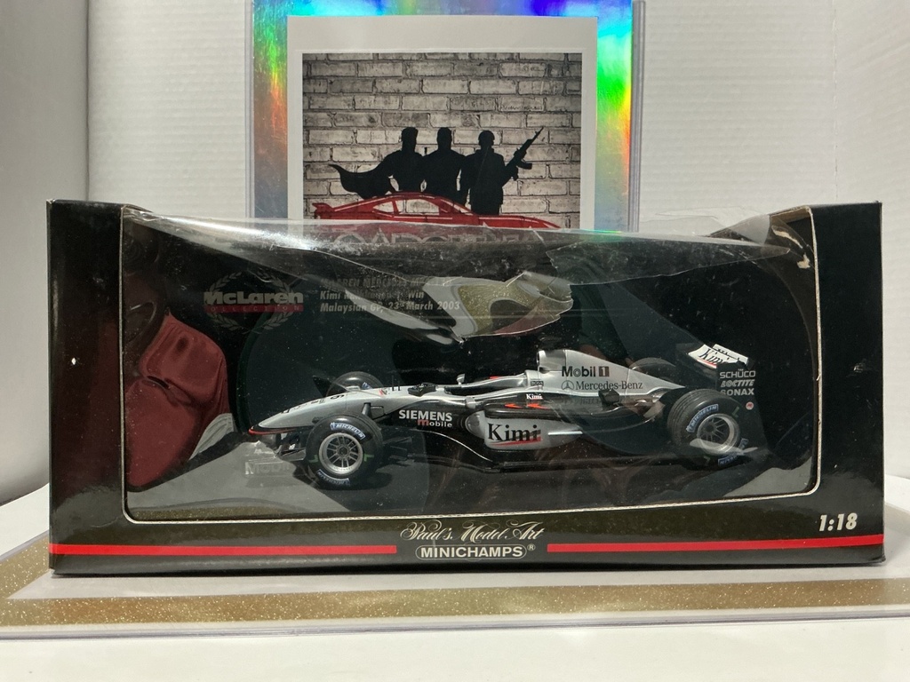1:18 MINI CHAMPS MCLAREN COLLECTION KIMI RAIKKONEN MALAYSIAN GP [DAMAGED BOX] image