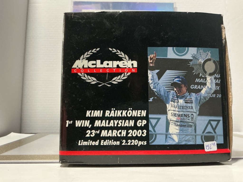 1:18 MINI CHAMPS MCLAREN COLLECTION KIMI RAIKKONEN MALAYSIAN GP [DAMAGED BOX] image