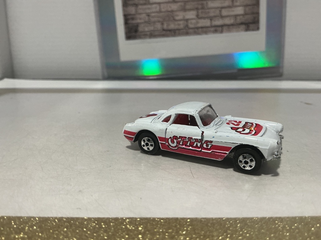 1/64 ROAD CHAMPS - ‘57 CORVETTE HARRISON - STING #22 image