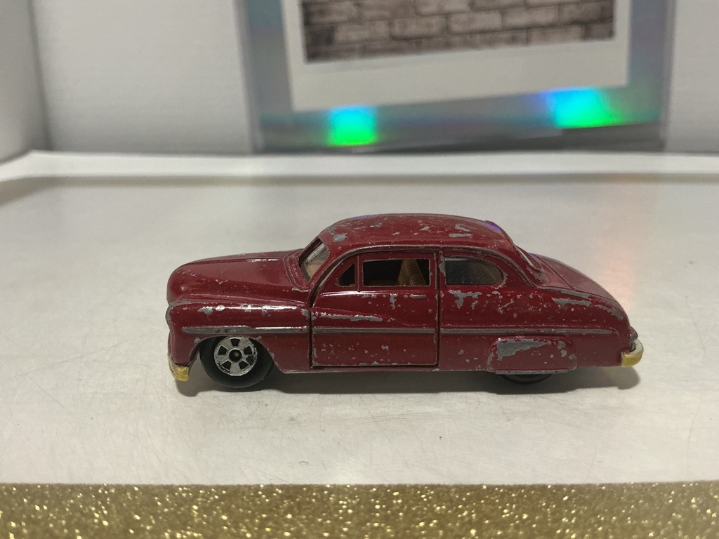 1/64 ERTL REPLICA ‘50 MERCURY MADE IN HONG KONG - PAINT WEAR image