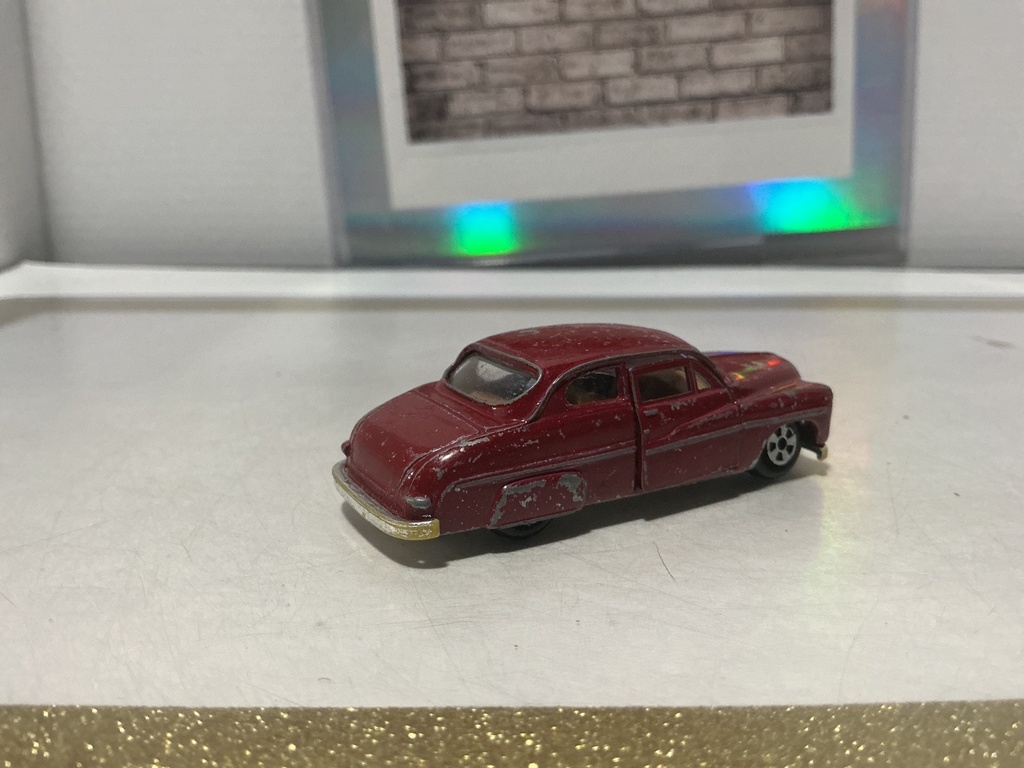 1/64 ERTL REPLICA ‘50 MERCURY MADE IN HONG KONG - PAINT WEAR image