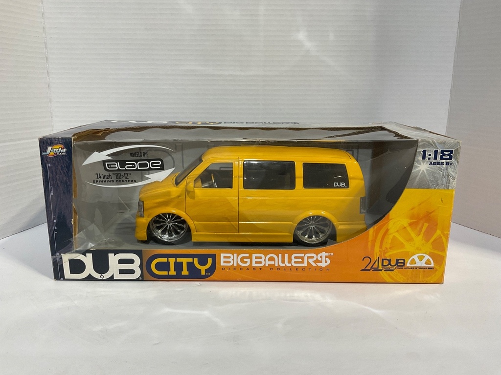 [111889] 1:18 JADA TOYS DUB CITY (DISPLAYED) CHEVROLET ASTRO VAN YELLOW ON GREY