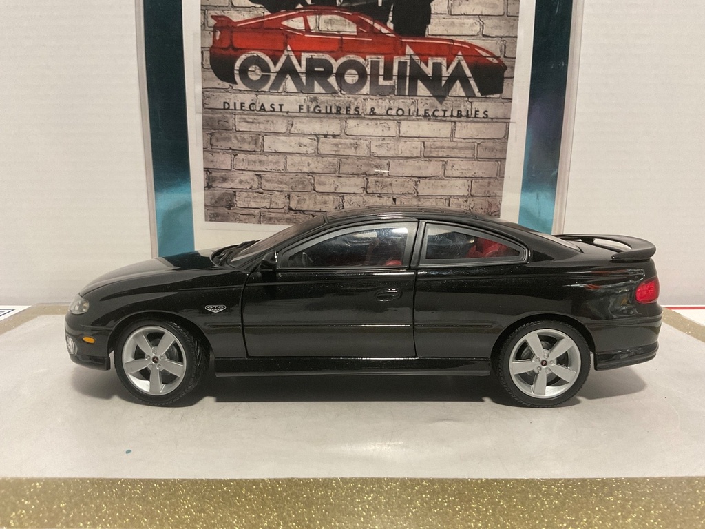 [111106] 1/18: RACING CHAMPIONS ZOO4 PONTIAC GTO BLACK ON RED