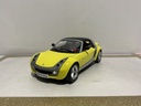 1/18: BURAGO ITALY SMART ROADSTER YELLOW ON RED