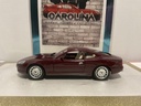 1/18: GUILOY ASTON MARTIN OB7 PLUM ON WHITE