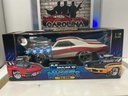 1/18: MUSCLE MACHINES RED WHITE AND BLUE ‘66 GTO [WATER DAMAGED BOX]