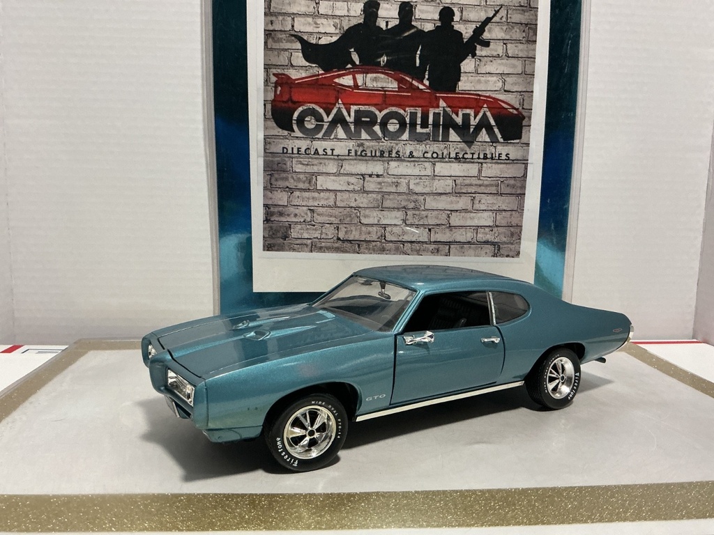 1/18: ERTL 1969 PONTIAC GTO BLUE ON BLACK