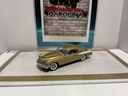 1/24: DANBURY MINT 1957 STUDEBAKER GOLDEN HAWK