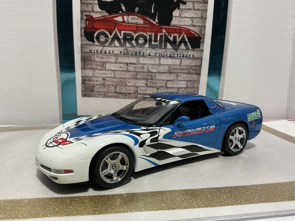 1/18: UT MODEL CHEVY CORVETTE ROLEX *CRACKS IN PAINT* BLUE AND WHITE ON BLACK