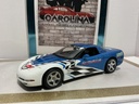 1/18: UT MODEL CHEVY CORVETTE ROLEX *CRACKS IN PAINT* BLUE AND WHITE ON BLACK