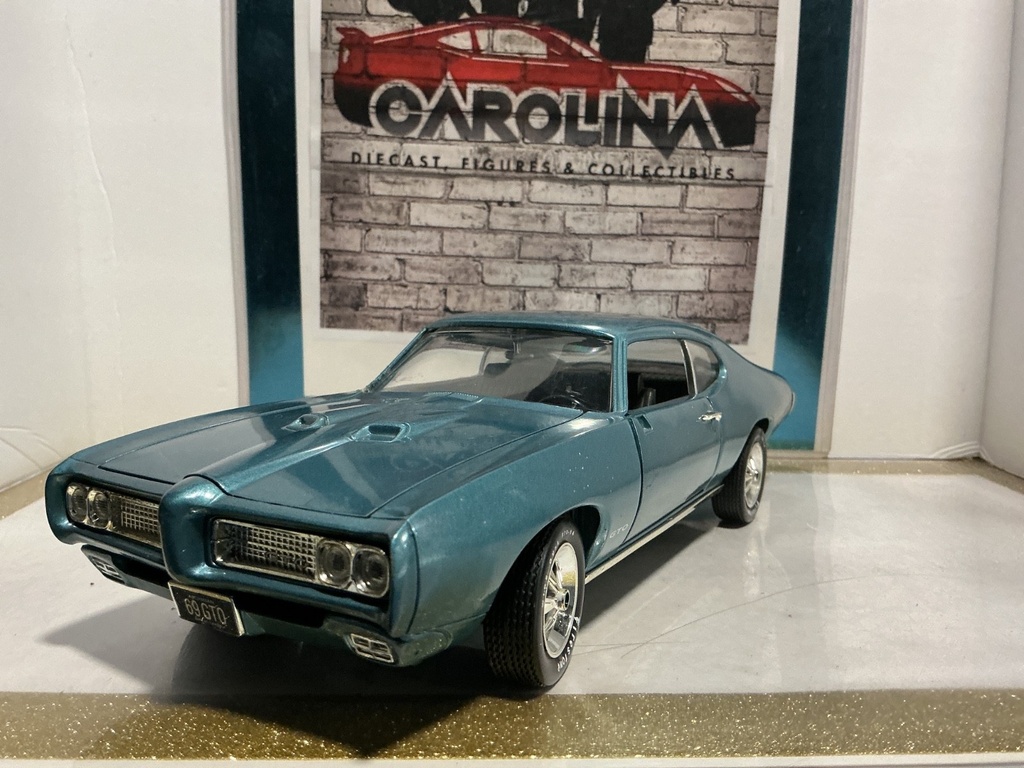 1:18 ERTZ 1969 PONTIAC GTO BLUE ON BLACK (NO MIRROR/WINDSHEILD)