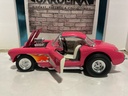 1:18 ROAD LEGENDS 1957 CORVETTE PINK ON WHITE [LIGHT RASHING]