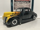 1:18 UNIVERSAL HOBBIES 1940 FORD DELUXE BLACK W/ FLAMES  [NO BOX]