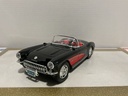 1:18 BBURAGO 1957 CORVETTE BLACK ON RED [NO BOX]