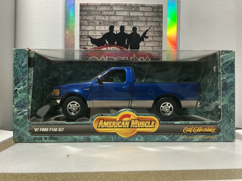 1:18 ERTL ‘97 FORD F150 XLT BLUE ON BROWN
