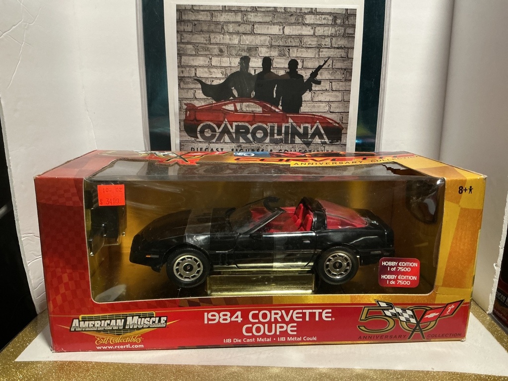 1:18 ERTL - AMERICAN MUSCLE 1984 CORVETTE COUPE [DAMAGED BOX] 50TH ANNIVERSARY