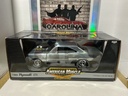 1:18 ERTL  AMERICAN MUSCLE 1969 PLYMOUTH GTX  [CHROME/GOLD ON BLACK]