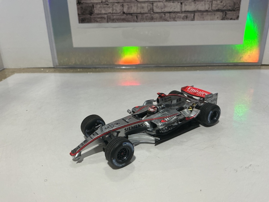 1/43 MINICHAMPS - McLaren Mp4-21 2006 Kimi Raikkonen [NO BOX, NO FRONT BUMPER]