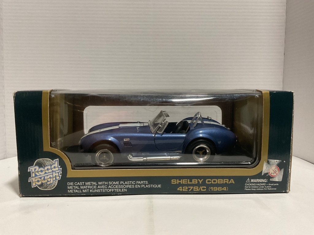 1:18 ROAD TOUGH SHELBY COBRA 427S/C 1964 BLUE/WHITE ON BLACK