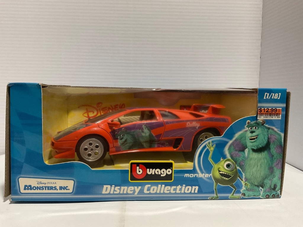 [112482] 1:18 BURAGO DISNEY COLLECTION MONSTERS INC SULLEY ORANGE/PURPLE