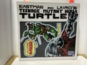 BST AXN - EASTMAN & LAIRD’S TEENAGE MUTANT NINJA TURTLES 4 PACK ACTION FIGURES