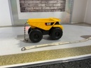 CAT DUMP TRUCK PLASTIC  SINGLE WHEEL **NO BOX