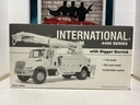 1/34 SCALE - FIRST GEAR INTERNATIONAL 4400 SERIES W/DIGGER DERRICK