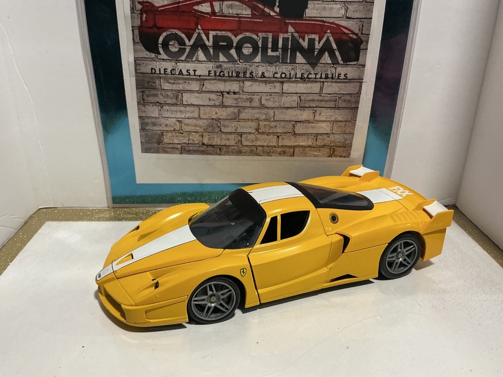 [117506.] 1:18 HOTWHEELS ELITE FERRARI FXX YELLOW ON BLACK