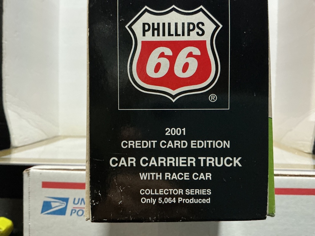 PHILLIPS 66 2001 CREDIT CARD EDITION CAR CARRIER TRUCK W/ RACE CAR