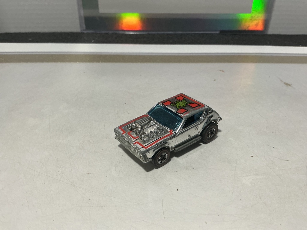 1/64 HOTWHEELS MATTEL - 1974 GREMLIN GRINDER SUPERCHROME RED LINE - HONG KONG
