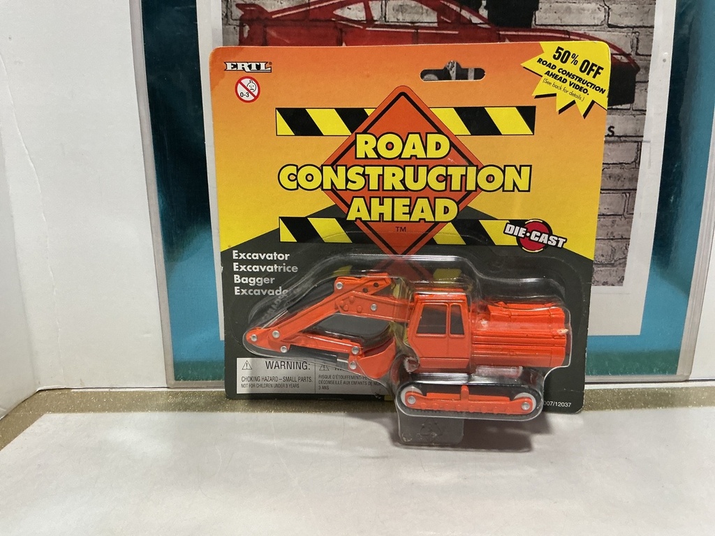1/64 SCALE - ERTL ROAD CONSTRUCTION AHEAD EXCAVATOR