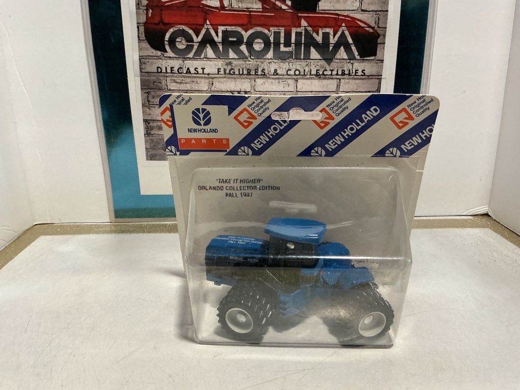 1/64 SCALE - NEW HOLLAND/ERTL #9682 “TAKE IT HIGHER” ORLANDO COLLECTION EDITION
