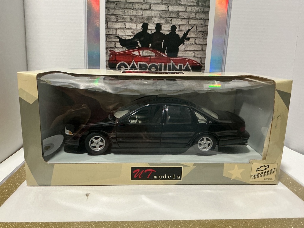 [112362] 1:18 UT MODELS CHEVROLET IMPALA SS 1996 DARK CHERRY