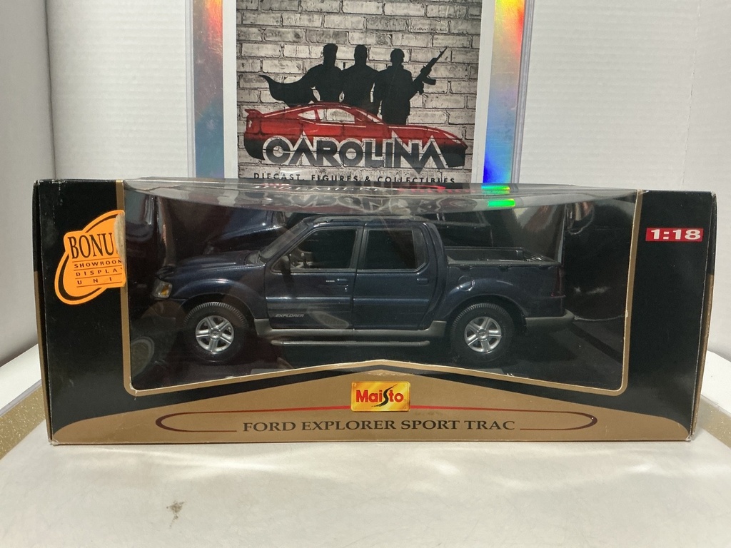 [112379] 1:18 MAISTO PREMIERE FORD EXPLORER SPORT TRAC DARK BLUE ON BLACK