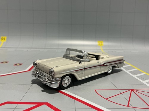 1:43 NEW RAY 1957 PONTIAC BONNEVILLE WHITE WITH RED STRIPE