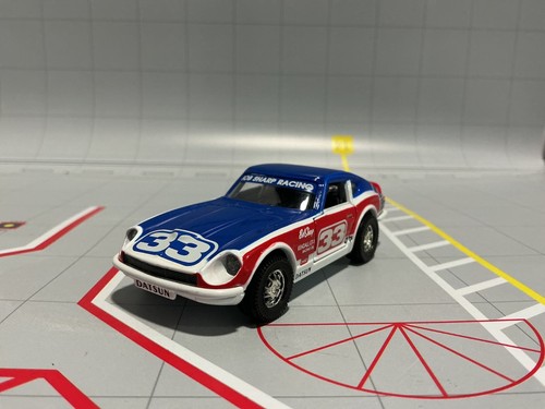 1:43 CORGI BOB SHARP DATSUN 240Z RED - WHITE - BLUE