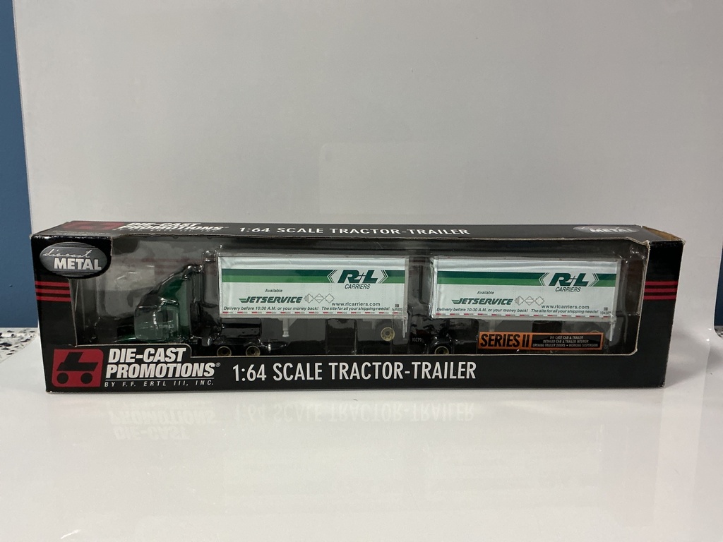 [111964.] 1:64 DCP DIE-CAST PROMOTIONS R+L CARRIERS INTERNATIONAL WITH PUPS #30692