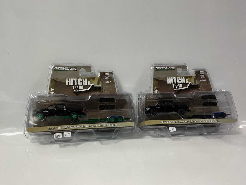 [112079.] 1:64 GREENLIGHT HITCH & TOW 2015 RAM AND TRAILER PAIR WITH CHASE