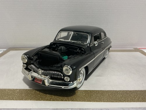 [119074.] 1/18 ERTL 1949 MERCURY BLACK ON GREY (HOO IS MISSING)