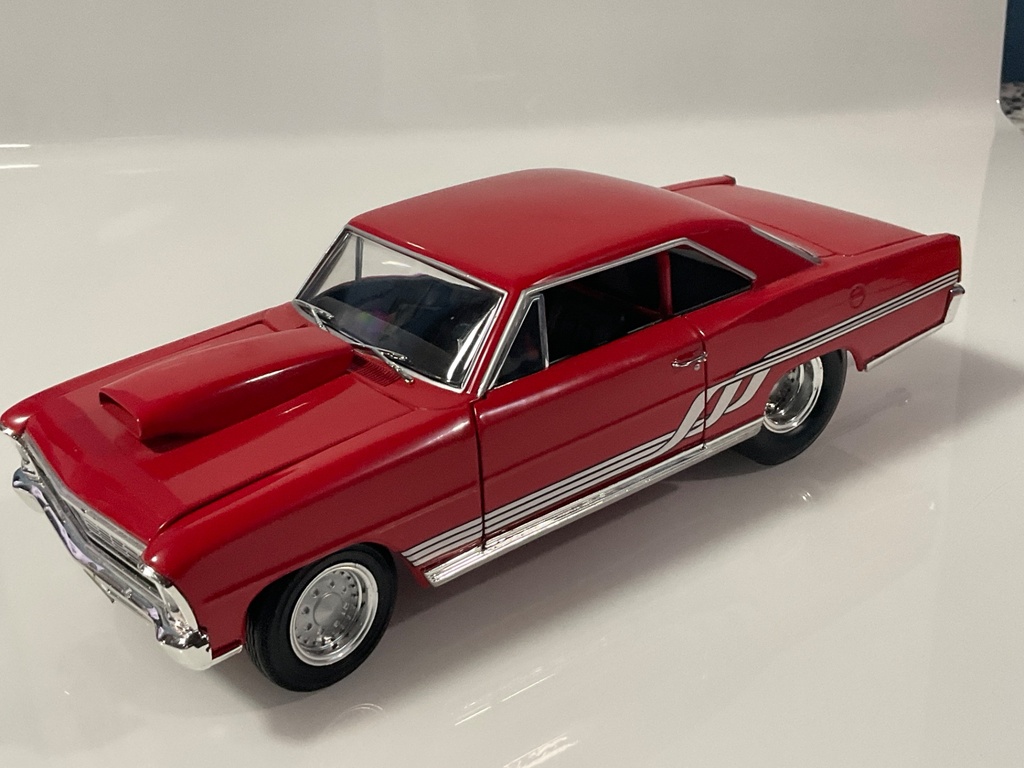 [119148.] 1/18 ERTL 1966 CHEVY NOVA RED/WHITE ON BLACK
