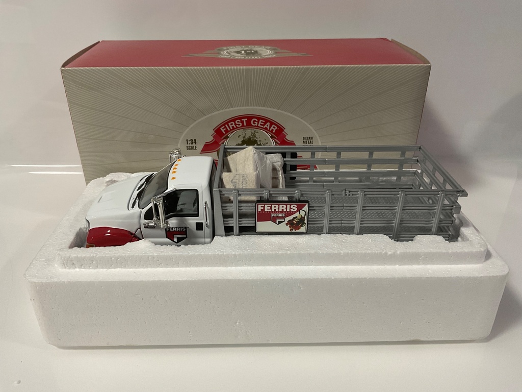 [112115.] 1/34 FIRST GEAR FORD F 650 STAKE TRUCK FERRIS 19-3776