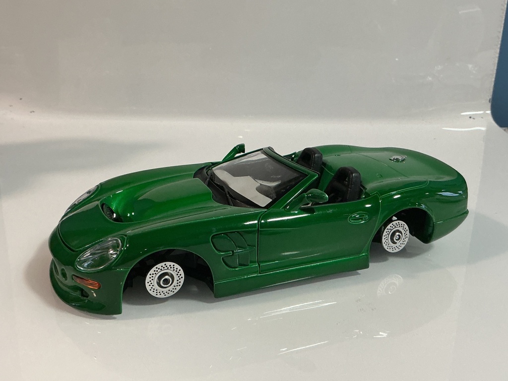 1/18 BURAGO SHELBY SERIES 1 1999 GREEN ON WHITE/BLACK