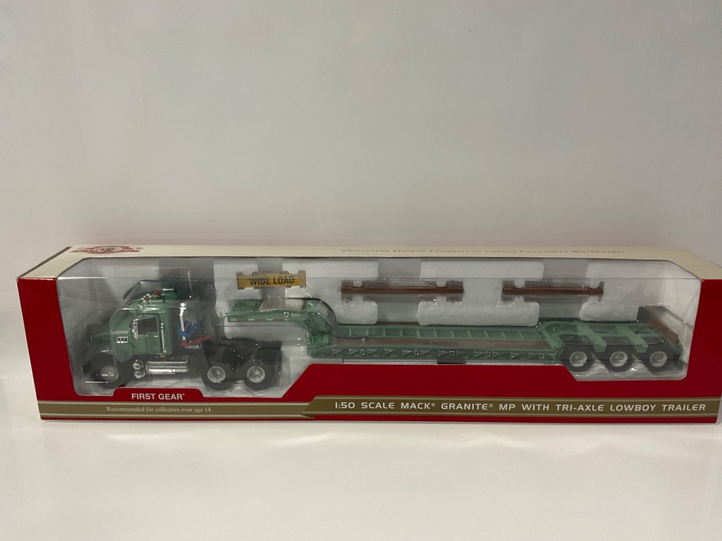 [118946.] 1/50 FIRST GEAR MACK GRANITE MP W/ TRI AXLE LOWBOY TRAILER US FOREST SERVICE 50-3127